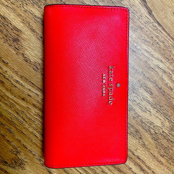 kate spade Handbags - Kate spade large bifold wallet staci in the color gazpacho